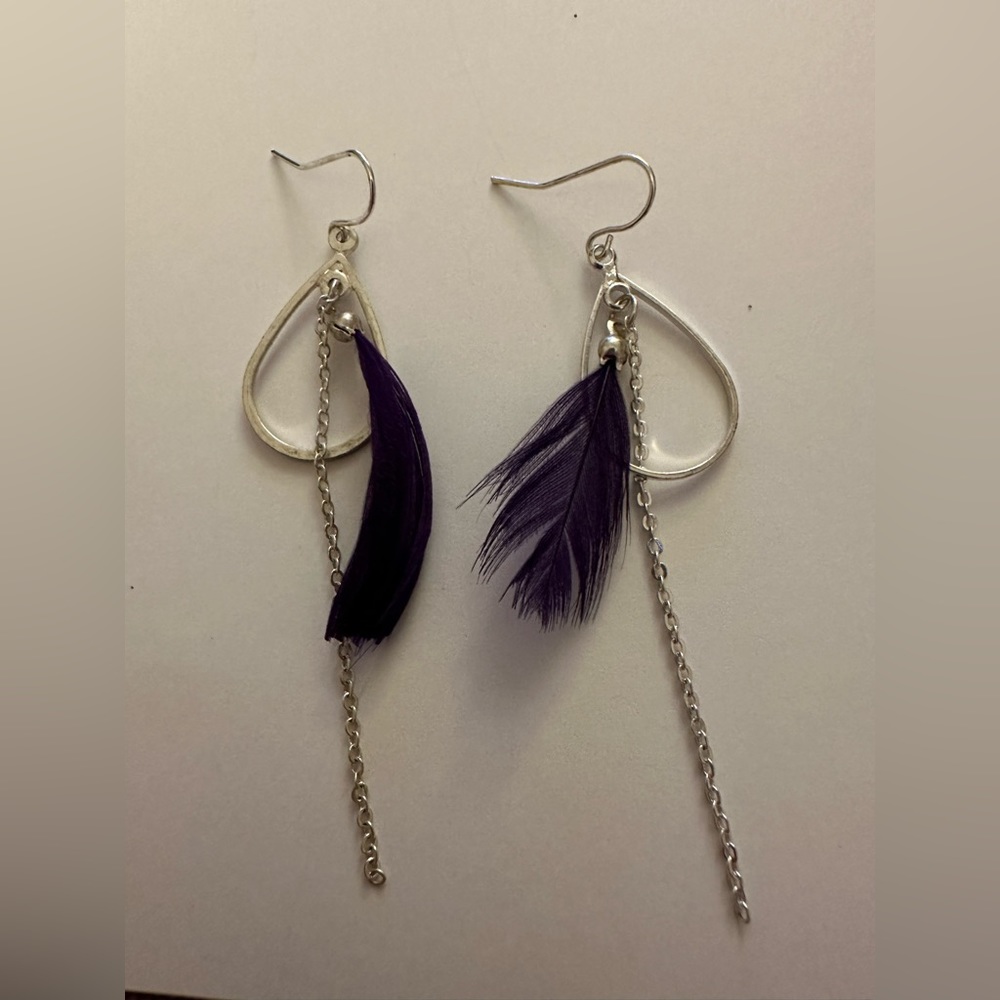 Purple feather earrings with silver oval hoop